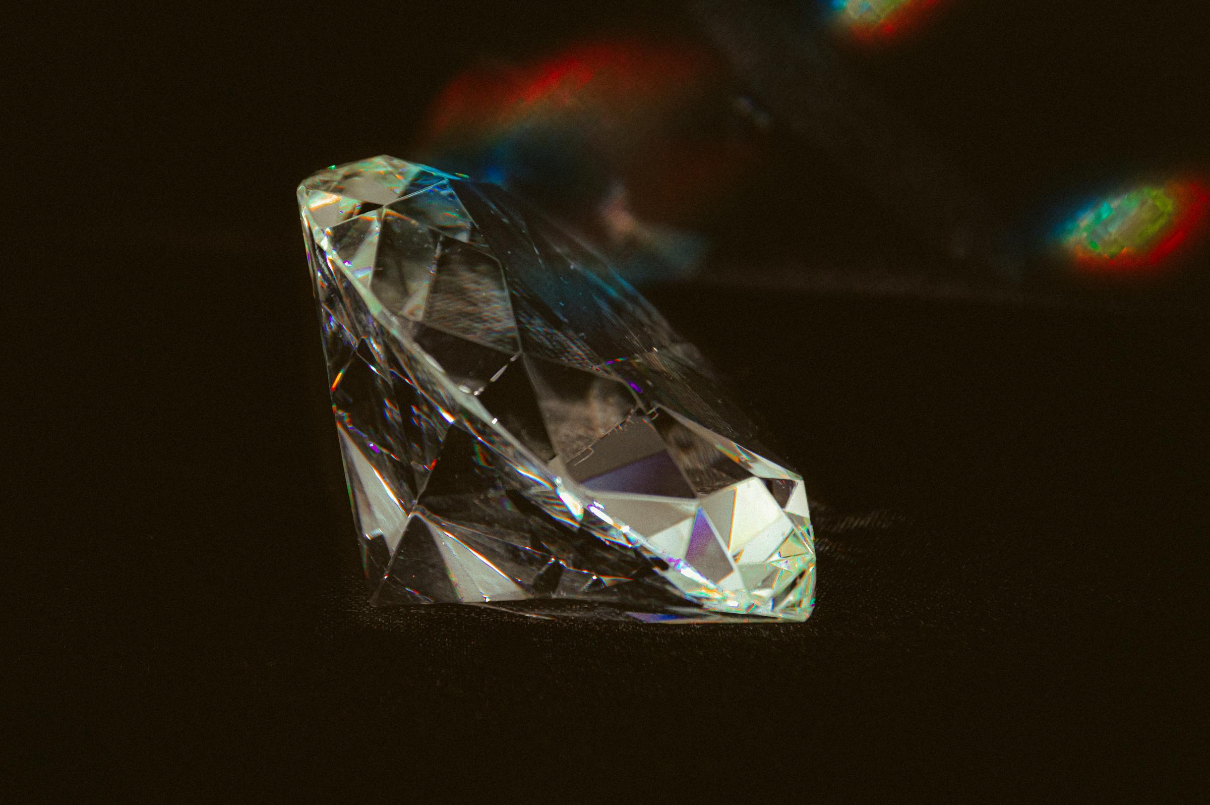 A fine jewellery piece examined in close detail during verification.